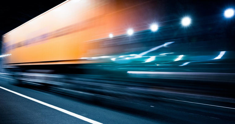 Abstract image of speeding truck